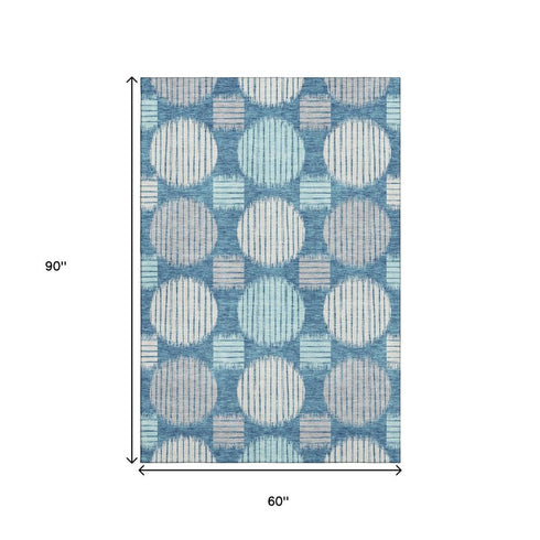 5' X 8' Teal Ivory And Gray Geometric Washable Area Rug With UV Protection