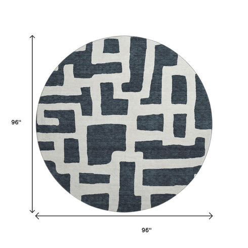 8' Black And Ivory Abstract Geometric Washable Round Rug With UV Protection