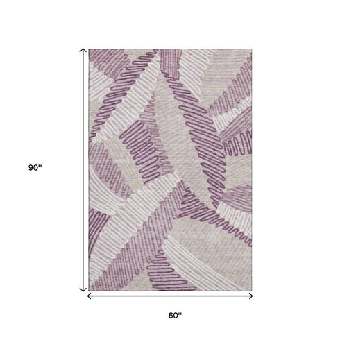 5' X 8' Lavender Ivory And Beige Floral Washable Area Rug With UV Protection