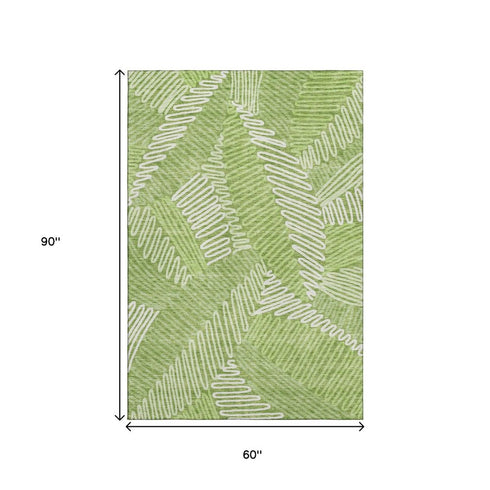 5' X 8' Lime Green And Ivory Floral Washable Area Rug With UV Protection