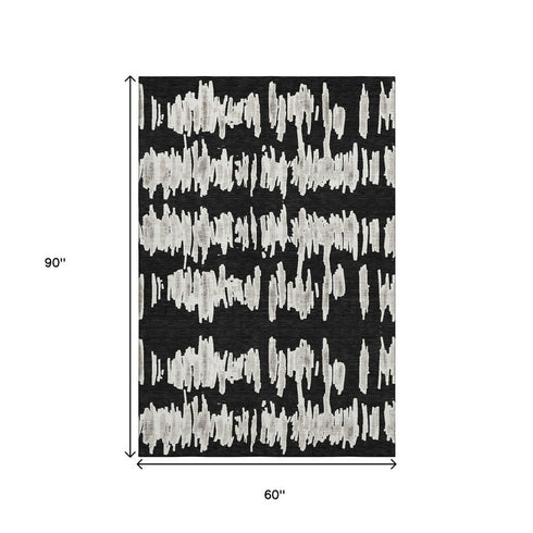 5' X 8' Black And Ivory Striped Washable Area Rug With UV Protection