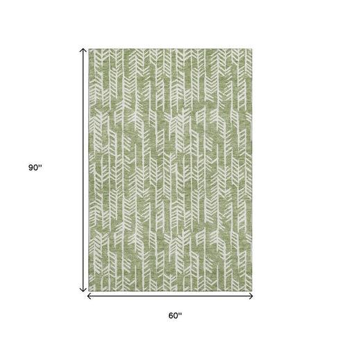 5' X 8' Green And Ivory Tribal Washable Area Rug With UV Protection
