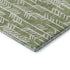 5' X 8' Green And Ivory Tribal Washable Area Rug With UV Protection