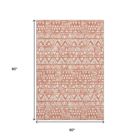 5' X 8' Coral And Beige Southwestern Washable Area Rug With UV Protection