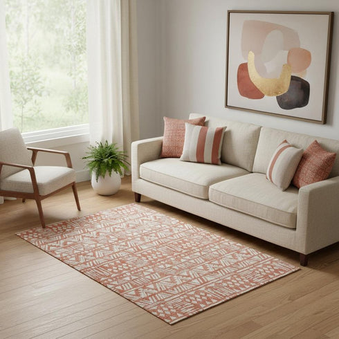 5' X 8' Coral And Beige Southwestern Washable Area Rug With UV Protection