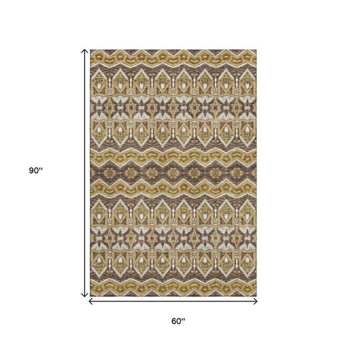 5' X 8' Gold Brown And Ivory Moroccan Washable Area Rug With UV Protection
