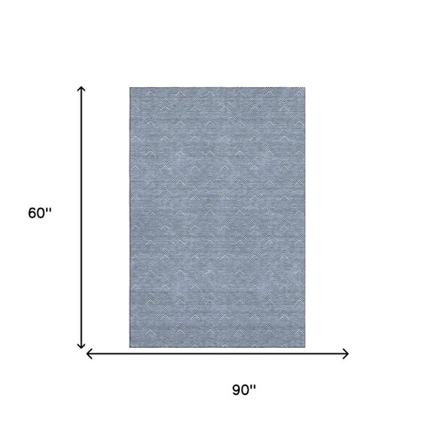 5' X 8' Blue And Ivory Abstract Geometric Washable Area Rug With UV Protection