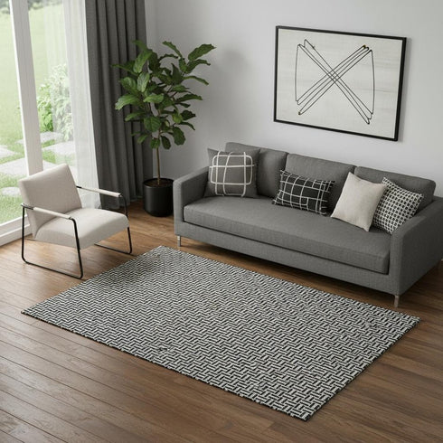5' X 8' Black And Ivory Geometric Washable Area Rug With UV Protection