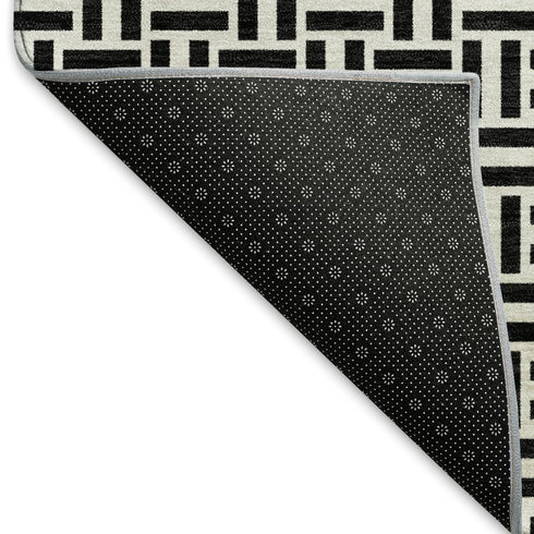 9' X 12' Black And Ivory Geometric Washable Area Rug With UV Protection