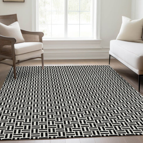 9' X 12' Black And Ivory Geometric Washable Area Rug With UV Protection