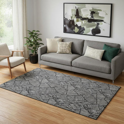 5' X 8' Black And Ivory Floral Washable Area Rug With UV Protection