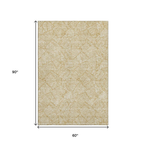 5' X 8' Gold And Ivory Floral Washable Area Rug With UV Protection