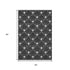 5' X 8' Black And Ivory Abstract Geometric Washable Area Rug With UV Protection
