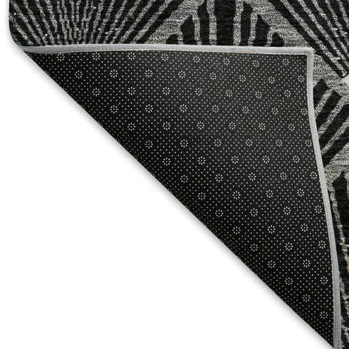 5' X 8' Black And Ivory Abstract Geometric Washable Area Rug With UV Protection