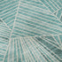8' Teal And Ivory Geometric Washable Round Rug With UV Protection