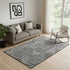 5' X 8' Black And Ivory Abstract Geometric Washable Area Rug With UV Protection