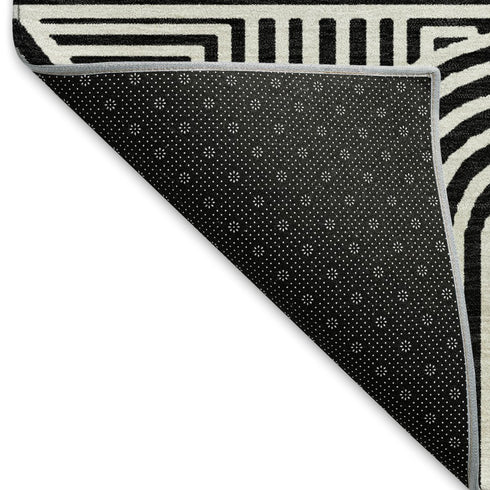 5' X 8' Black And Ivory Abstract Geometric Washable Area Rug With UV Protection