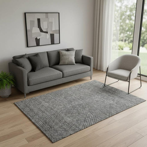 5' X 8' Charcoal And Ivory Abstract Geometric Washable Area Rug With UV Protection