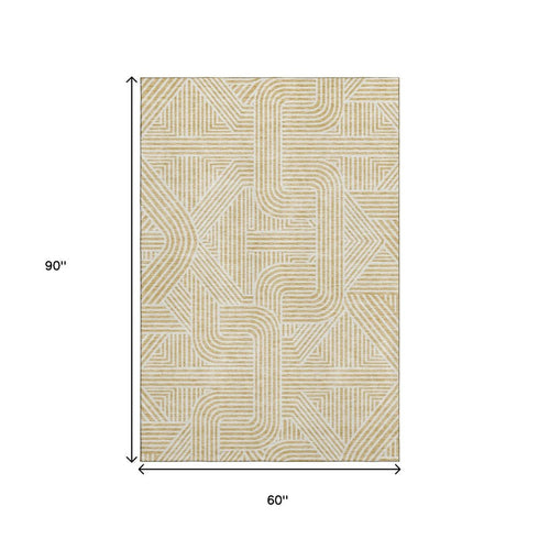 5' X 8' Gold And Ivory Abstract Geometric Washable Area Rug With UV Protection
