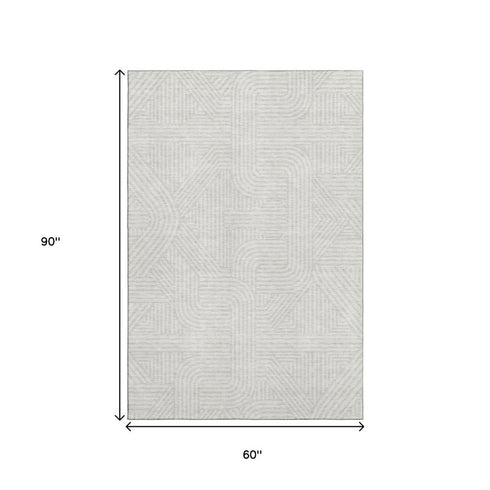 5' X 8' Ivory And Beige Abstract Geometric Washable Area Rug With UV Protection