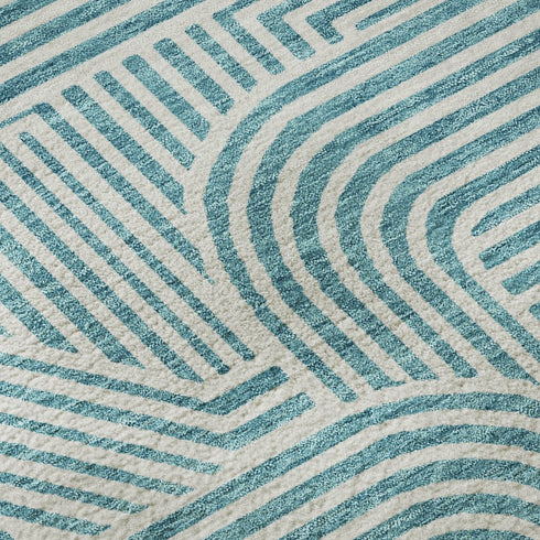 8' X 10' Teal And Ivory Abstract Geometric Washable Area Rug With UV Protection