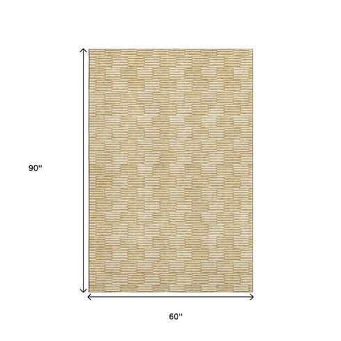 5' X 8' Gold And Ivory Abstract Geometric Washable Area Rug With UV Protection