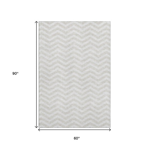 5' X 8' Ivory And Beige Chevron Washable Area Rug With UV Protection
