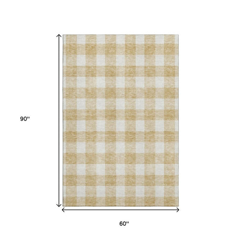 5' X 8' Gold And Ivory Plaid Washable Area Rug With UV Protection