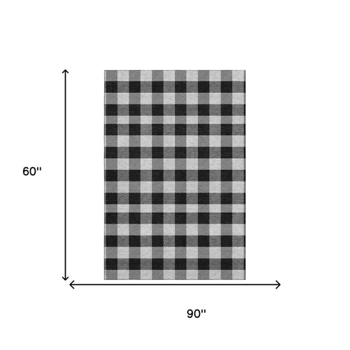 5' X 8' Black And Ivory Plaid Washable Area Rug With UV Protection