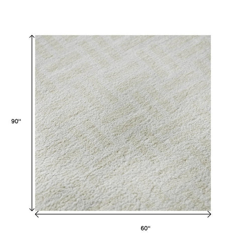5' X 8' Ivory And Beige Abstract Geometric Washable Area Rug With UV Protection