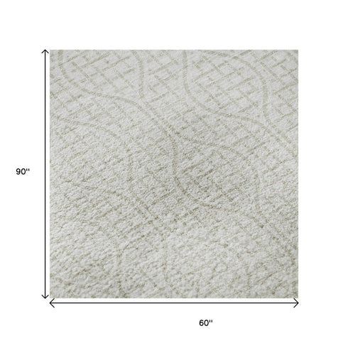 5' X 8' Ivory And Beige Geometric Washable Area Rug With UV Protection