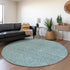 8' Teal And Ivory Geometric Washable Round Rug With UV Protection