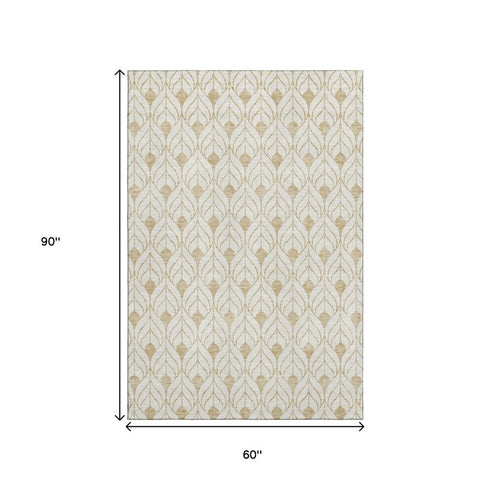 5' X 8' Gold And Ivory Geometric Washable Area Rug With UV Protection