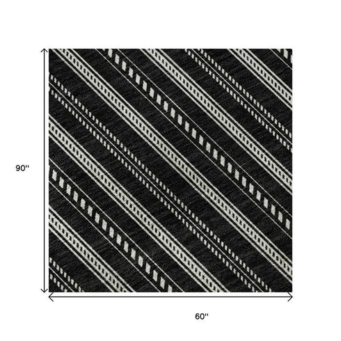 5' X 8' Black And Ivory Striped Washable Area Rug With UV Protection