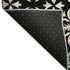 5' X 8' Black And Ivory Floral Washable Area Rug With UV Protection