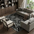 8' X 10' Black And Ivory Floral Washable Area Rug With UV Protection