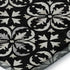 8' X 10' Black And Ivory Floral Washable Area Rug With UV Protection