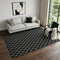5' X 8' Black And Ivory Geometric Washable Area Rug With UV Protection