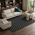 8' X 10' Black And Ivory Geometric Washable Area Rug With UV Protection