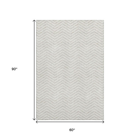 5' X 8' Ivory And Beige Chevron Washable Area Rug With UV Protection