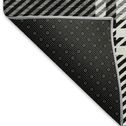 5' X 8' Black Ivory And Gold Plaid Washable Area Rug With UV Protection
