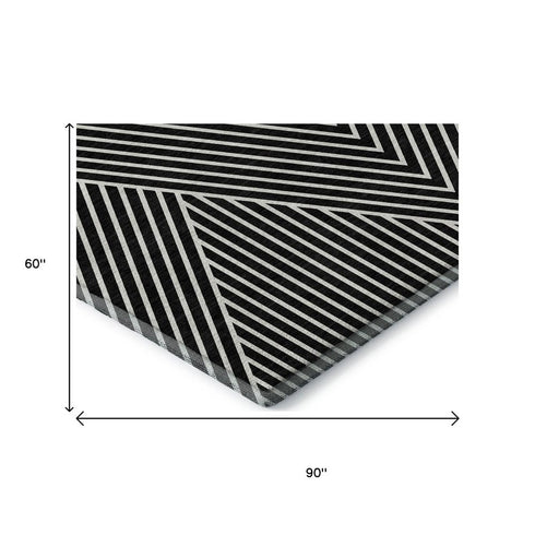 5' X 8' Black And Ivory Geometric Washable Area Rug With UV Protection