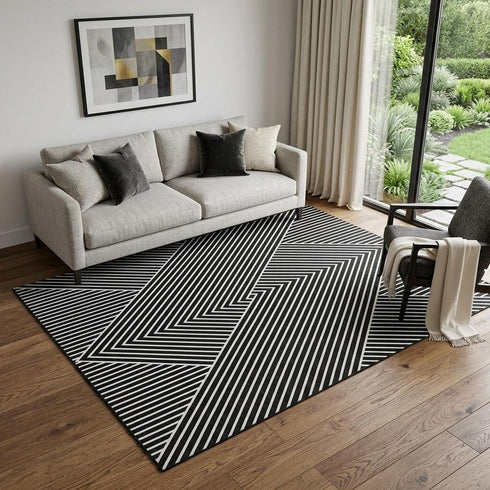 5' X 8' Black And Ivory Geometric Washable Area Rug With UV Protection