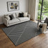 5' X 8' Black And Ivory Geometric Washable Area Rug With UV Protection