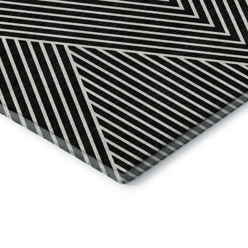 5' X 8' Black And Ivory Geometric Washable Area Rug With UV Protection