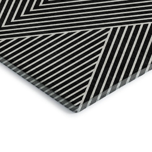 5' X 8' Black And Ivory Geometric Washable Area Rug With UV Protection