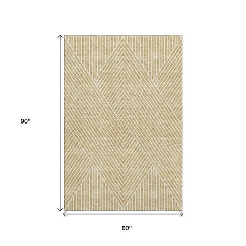 5' X 8' Gold And Ivory Geometric Washable Area Rug With UV Protection