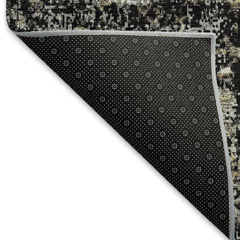 5' X 8' Black And Ivory Abstract Washable Area Rug With UV Protection