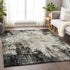 9' X 12' Black And Ivory Abstract Washable Area Rug With UV Protection