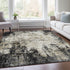 9' X 12' Black And Ivory Abstract Washable Area Rug With UV Protection